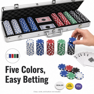 Poker chip set with five colors in a case, surrounded by chips and cards