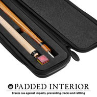 Black padded cue case with two wooden cue sticks and pink chalk block inside