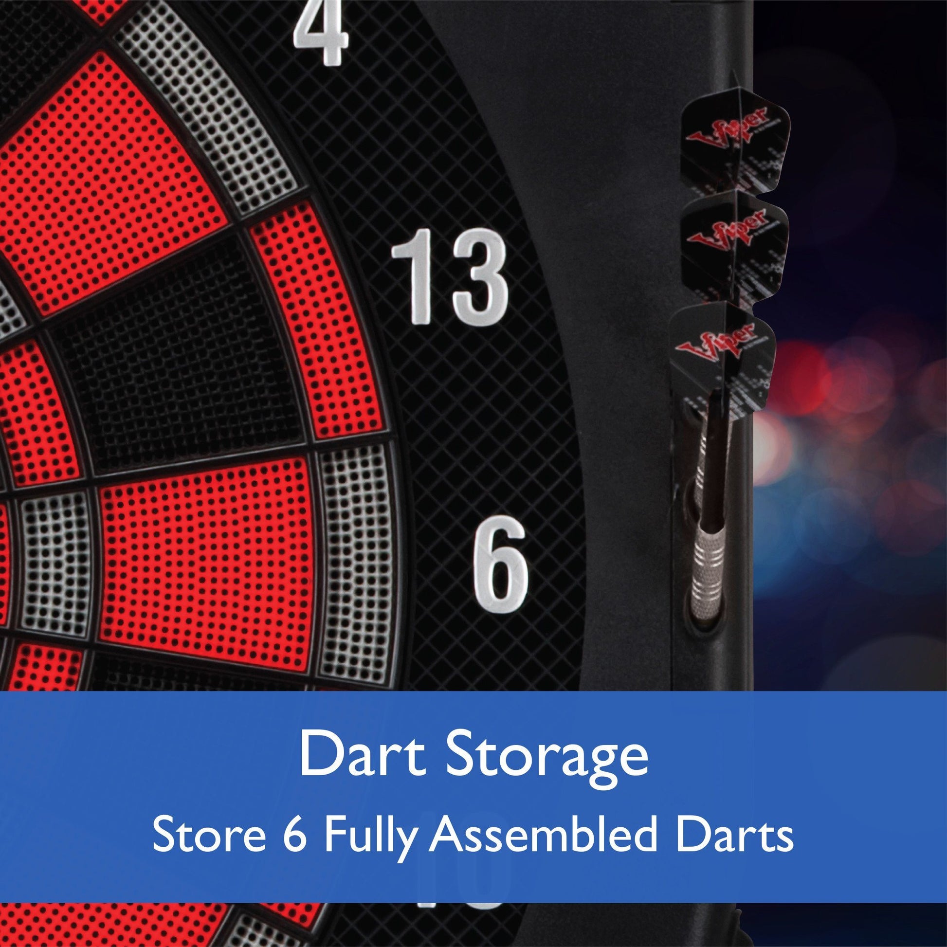 Electronic dartboard with red and black segments and three darts mounted on the side