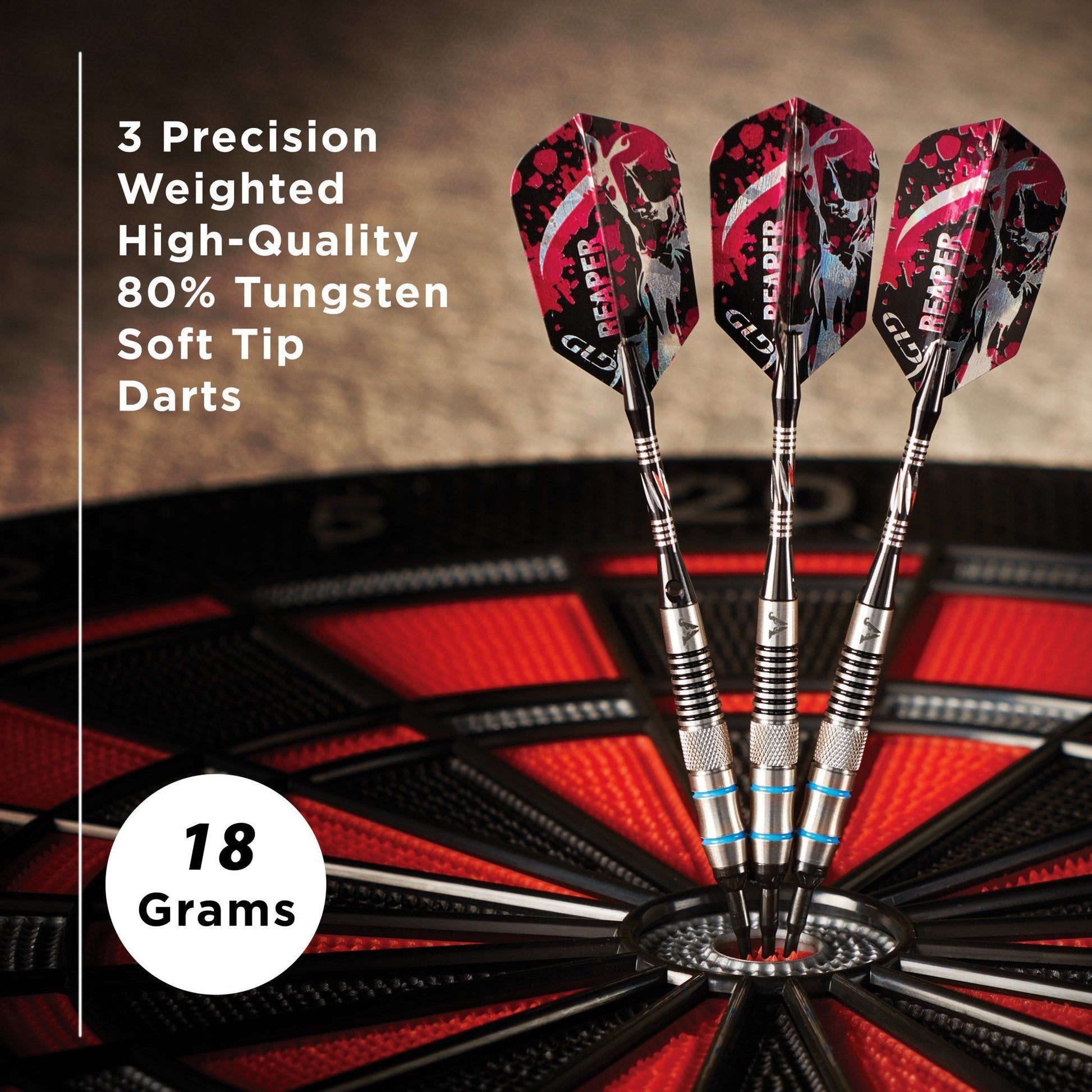 Three red and black skull-patterned soft-tip darts with silver barrels in a dartboard, 18 grams
