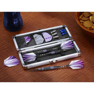 Aluminum case holding purple and white striped darts with black barrels on wood surface