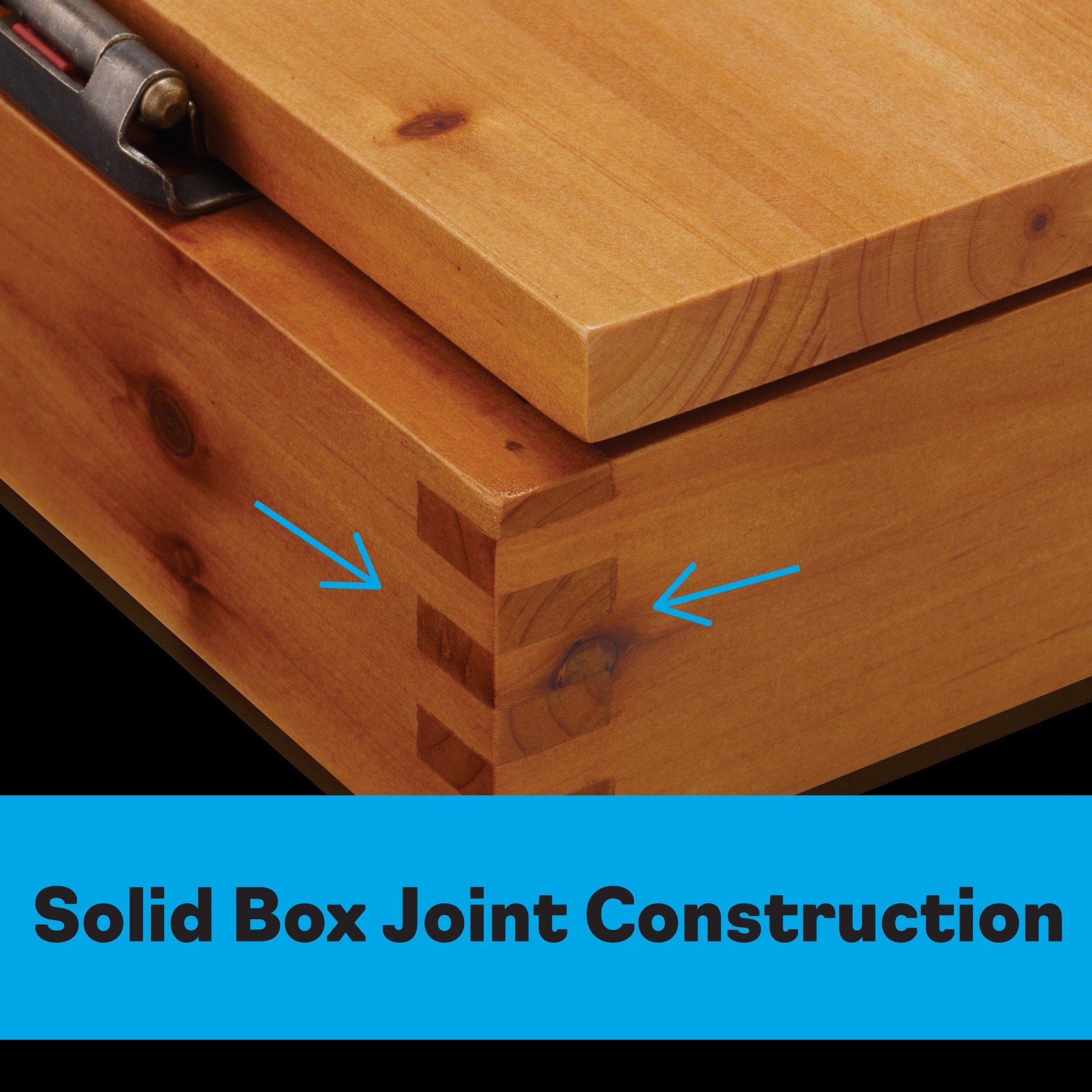 Close-up of light wood pieces with blue arrows indicating interlocking corner joints