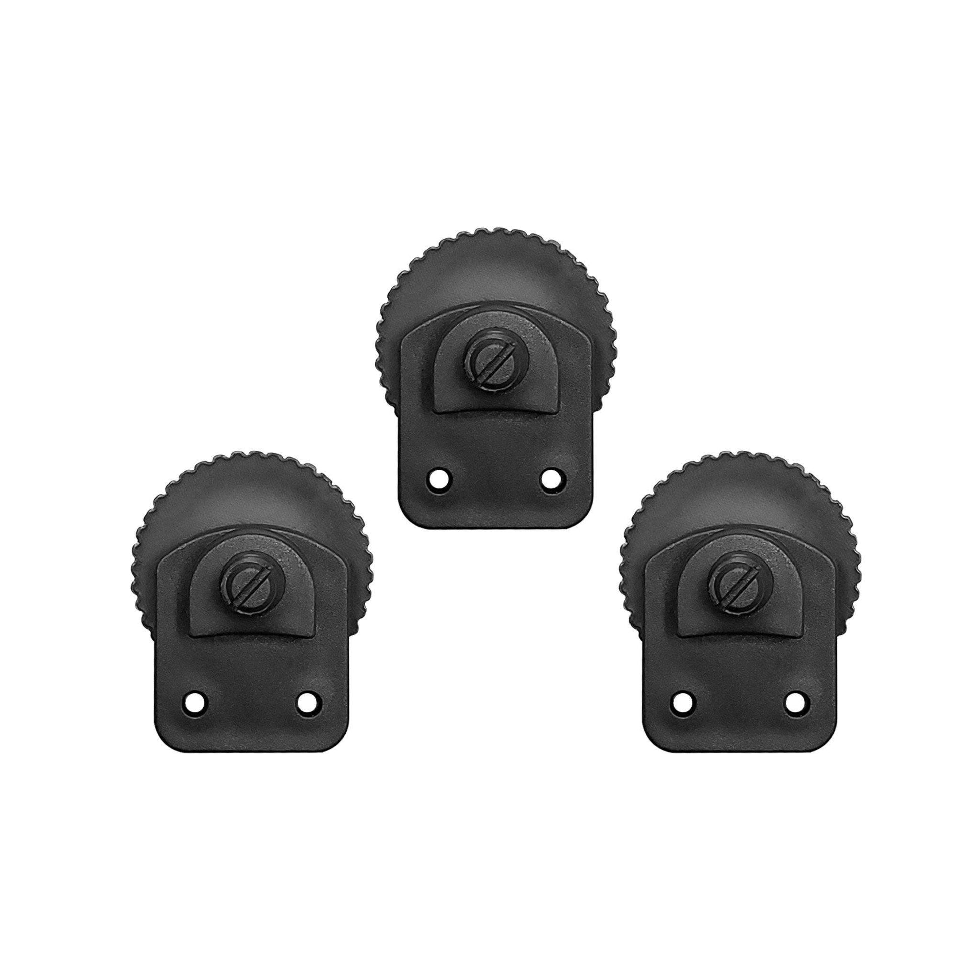 Three black plastic dartboard levelers with textured grip tops, adjustment screws, and mounting holes