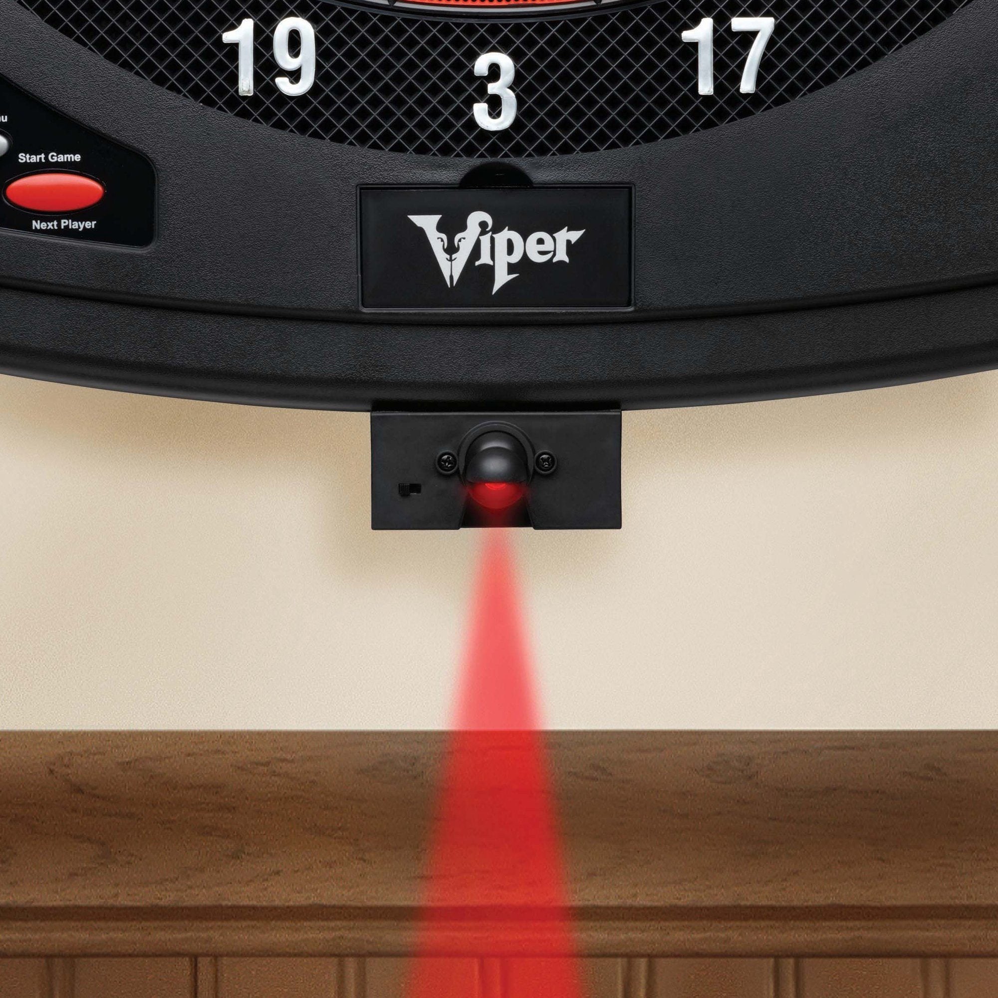 Electronic dartboard with red laser line projector mounted below scoring ring