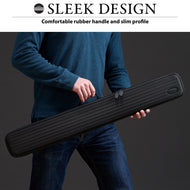 A person in a blue shirt holds a black ribbed cue case with tapered ends