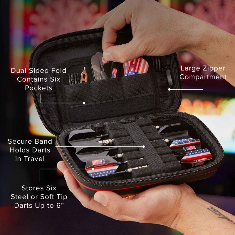 Two people holding open a black dart case with red trim and six darts with flag flights inside