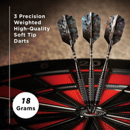 Three soft tip darts with patterned flights and textured grips stand in a dartboard stand, 18 grams each
