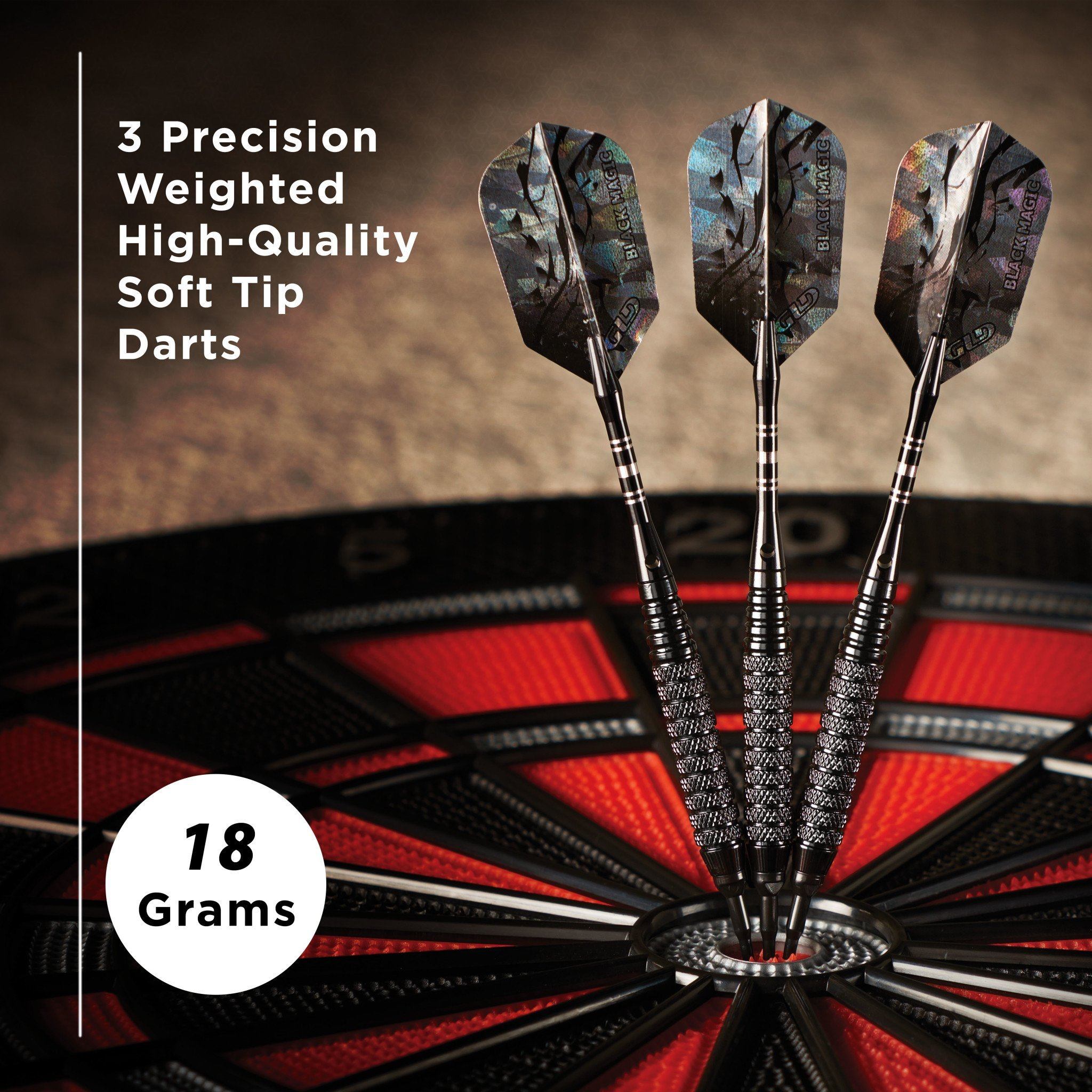 Three soft tip darts with patterned flights and textured grips stand in a dartboard stand, 18 grams each