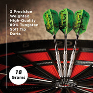 Three green-flight darts with silver barrels and soft tips displayed in a dartboard stand, 18 grams each