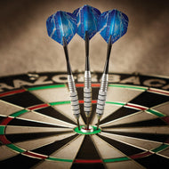 Three blue lightning-patterned darts with silver grip barrels and black tips embedded in dartboard bullseye