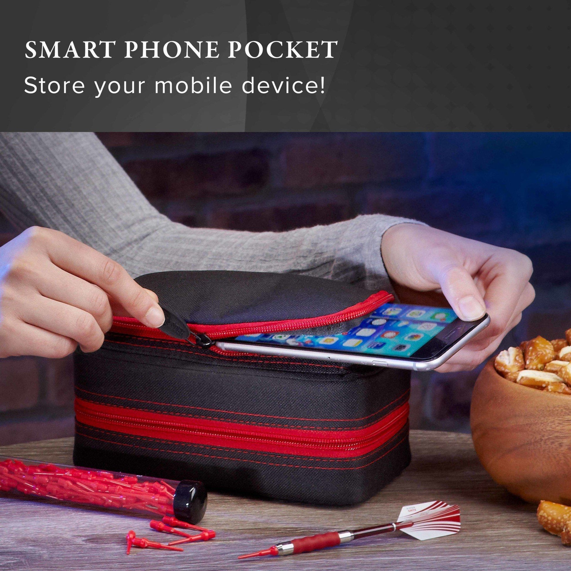 Person opening a black case with red zippers holding a smartphone inside