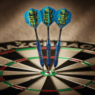 Three blue darts with yellow flights in dartboard bullseye