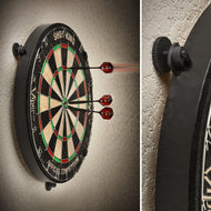 Dartboard with red darts stuck in face and black surround ring with mounting hardware