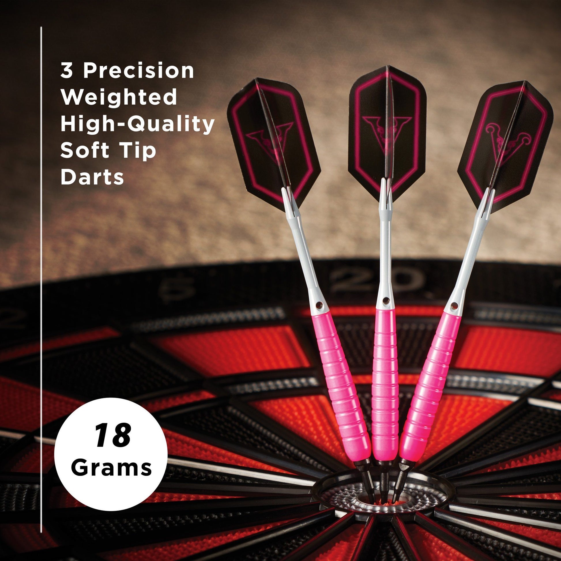 Three soft tip darts with pink wrapping and red flight designs in dartboard stand