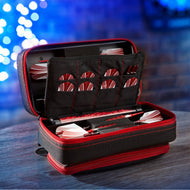 Open dart case with red and black exterior, black interior with pockets holding red and white striped darts